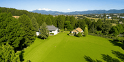 Mammotion LUBA 2 AWD lawn mowing scene
